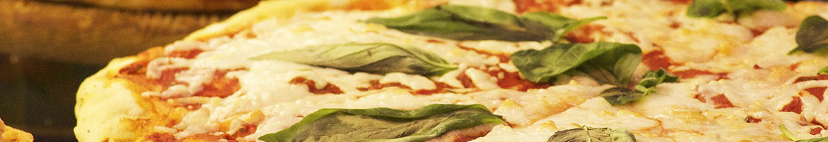 Eating Italian Pizza Sandwich at 900 Degrees Brick Oven Pizza restaurant in Purcellville, VA.